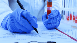 medical sample being held by a lab technician