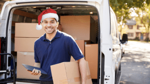 Christmas Courier wearing a santa hat